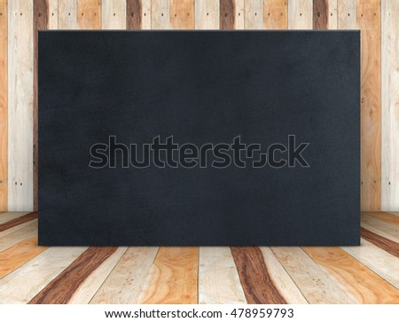 Blank black fabric poster canvas at wooden plank room,Mock up template for adding your content or design,Business presentation