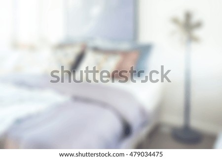 Blurred bedroom with bed