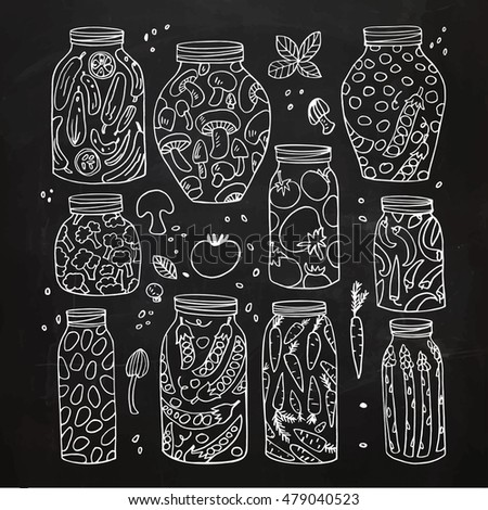 Preserved hand-drawn vector vegetables in jars isolated on chalkboard