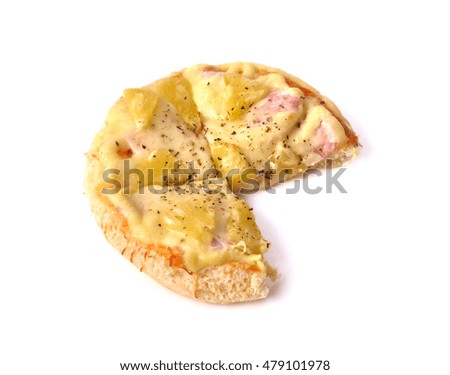 Homemade pizza with pineapple and cheese with hot dogs in front of flowers isolated on white background .