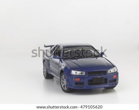 blue color toy car on the white background