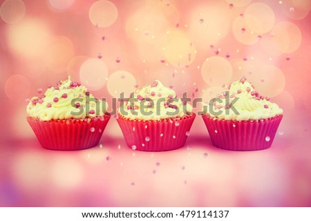 Tasty cupcake on pink background