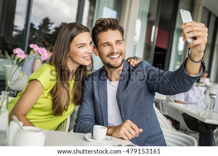 Beautiful couple taking a photo