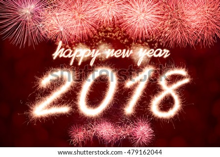 Happy new year 2018 written with Sparkle firework with firework background