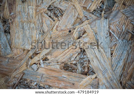hardboard - wood fiber board. the surface of a building material made ??from wood chips. Picture can be used as background