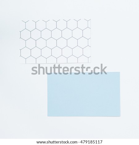 Blank blue and hexagon pattern name cards design on white background.