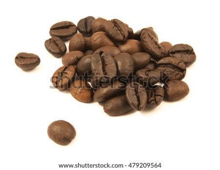 coffee beans in closeup isolated on white background