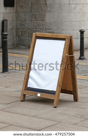 Empty Wooden Advertising A Board on Street Sidewalk