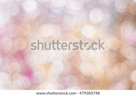 Blurred background in reddish tones with bokeh lights
