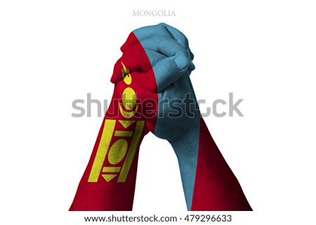 Man clasped hands patterned with the MONGOLIA flag