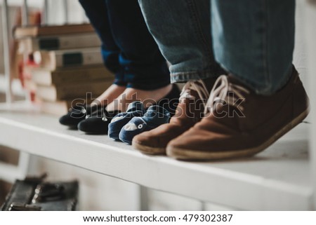 Family shoes on the white bench