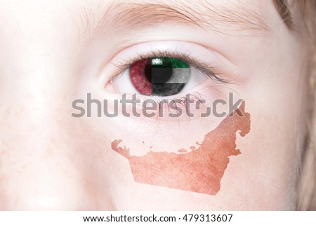 human's face with national flag and map of united arab emirates. concept