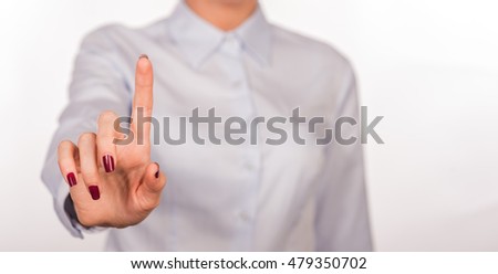 Business woman with pointing to something or touching a touch screen on white background