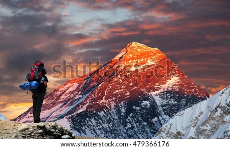 Evening colored view of Mount Everest from Gokyo valley with tourist on the way to Everest base camp, Sagarmatha national park, Khumbu valley, Nepal Royalty-Free Stock Photo #479366176