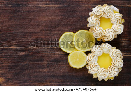 tartlet with lemon cream and meringue on a table