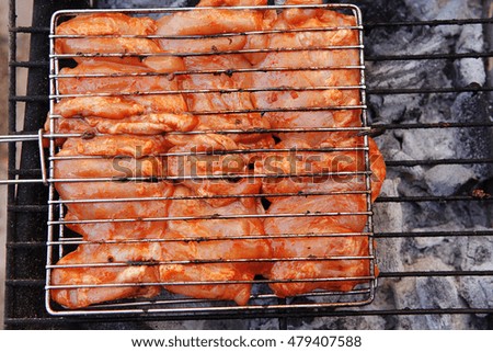 fresh chicken breast meat with vegetable kebab cooked on bbq grid 