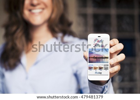 Smiling woman holding a mobile phone with photo filters app on the screen. Generic app template design.