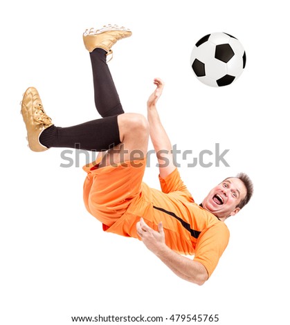 Soccer football player kicking the ball isolated on a white background