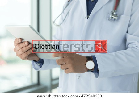 DOCTOR USING TABLET PC SEARCHING DIETITIAN ON WEB