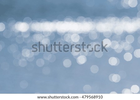 The Defocused Of Water surface with waves glittering in the sun.