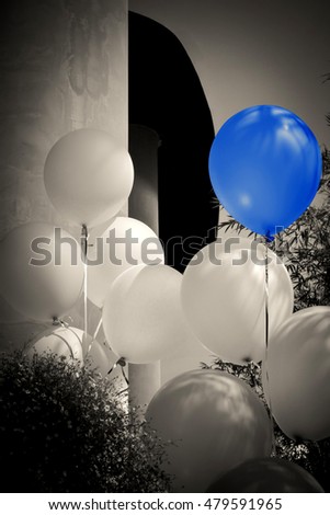 Grayscale and Low Key of image of white and one blue ballon.