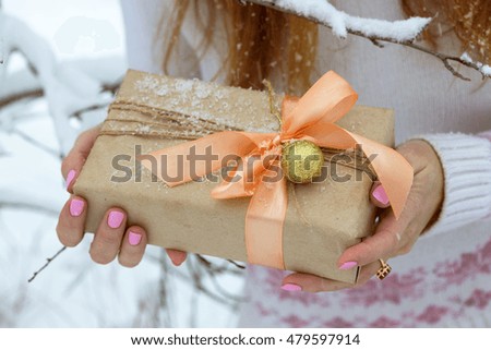 christmas - present in girl hands
