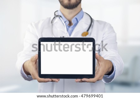 doctor showing digital tablet with blank white screen
