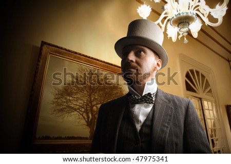 portrait of elegant man in a luxury interior