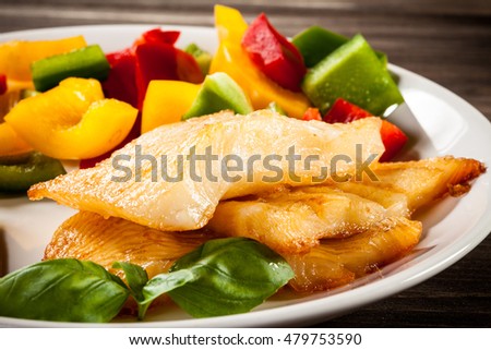 Fish dish - fried halibut and vegetables 