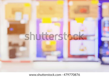 electronic department store with Television shelves blurred background

