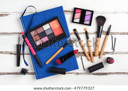 Overhead view of essential beauty items, Top view of cosmetics and female accessories