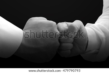 human hands in fight signal