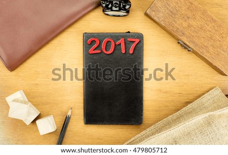 Wooden Table top with  clock,type box,notebook,leather bag and pencil, Template mock up for adding your word.