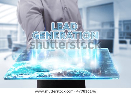 Business, Technology, Internet and network concept. Young businessman working on a tablet of the future, he sees the inscription: lead generation