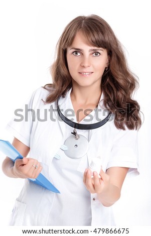 woman doctor holding a bottle of pills. focus on the doctor