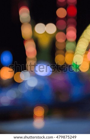 Defocused urban abstract texture background for your design. Multicolored defocused bokeh lights background.