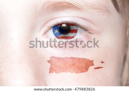 human's face with national flag and map of puerto rico. concept
