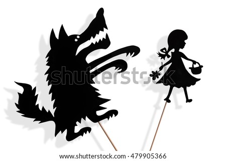 Little Red Riding Hood and the Big Bad Wolf shadow puppets and their shades on white background