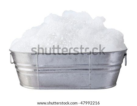 Soap Suds and Bubbles in a Tub isolated on white