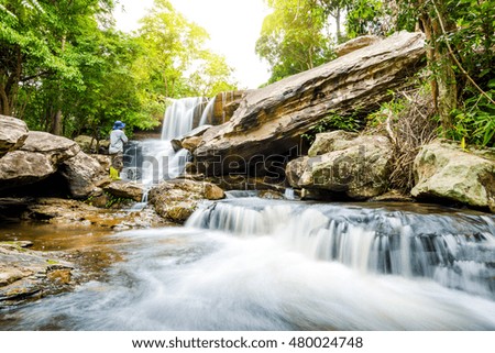 Landscape of peaceful waterfall in the tropical rain forest, thailand