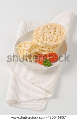 slices of puffed rice bread on white plate