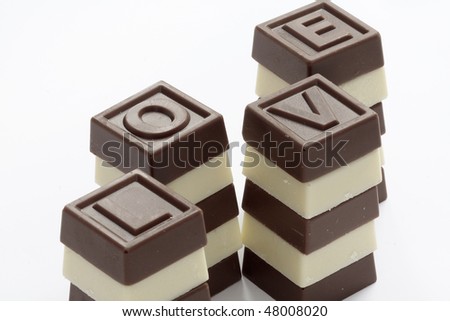love word made of brown and white chocolates