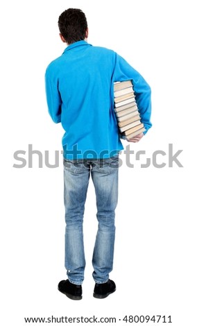 A man carries a heavy pile of books. back view. Rear view people collection. Isolated over white background. The curly-haired student in a blue sweater holding a warm armpit book.