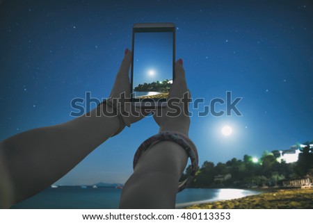 Using cellphone with de-focused beach, stars and night sky. My astronomy work.