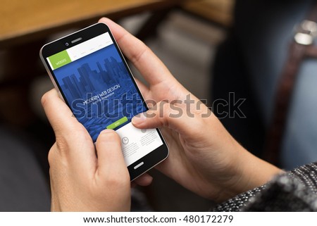 mobile design concept: girl using a digital generated phone with fresh and modern website on the screen. All screen graphics are made up.
