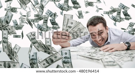 business, people, success and fortune concept - happy businessman with heap of dollar money