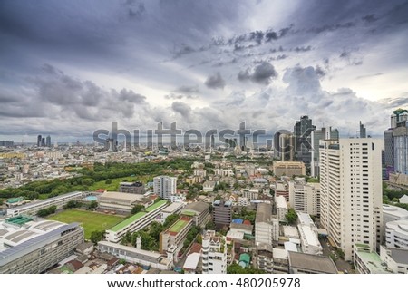 Aerial view of houses, apartment building under rain cloud day in central of Bangkok Thailand, 