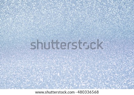  Abstract blue defocused glitter background 