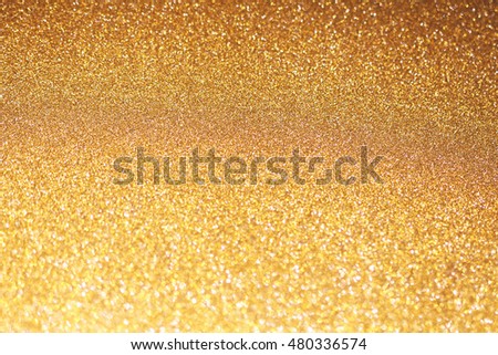  Gold defocused glitter background 