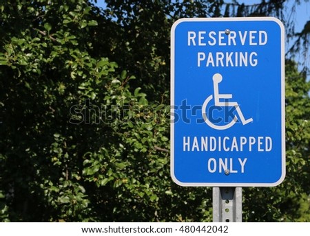 Reserved parking for Handicapped Only sign